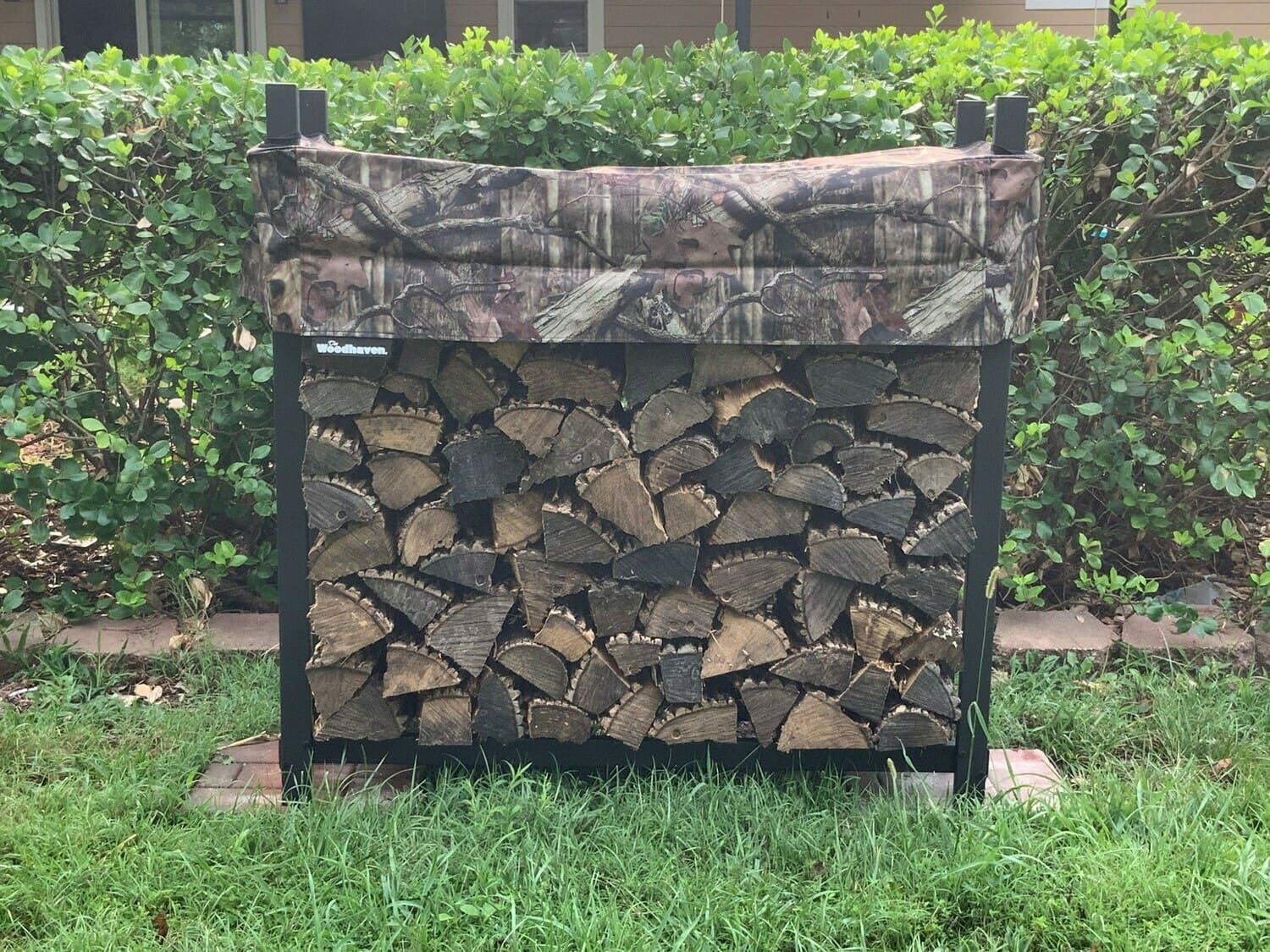 The Woodhaven 1/4 Cord Camo 4ft Firewood Rack with Cover